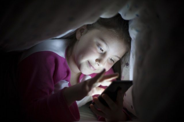 How old should kids be before they get a mobile phone?