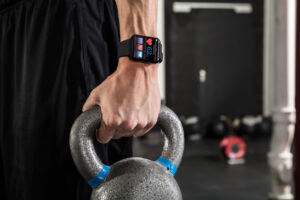 An Athlete Man Holding Kettle Bell