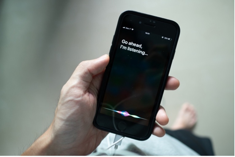 A hand holding a mobile phone