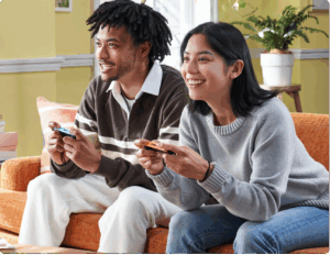 Two people playing Nintendo Switch game