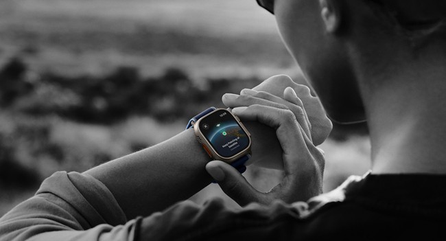 Apple Watch Ultra 3 being used with black and white photo effect